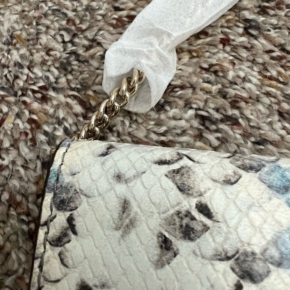 NWT Kate Spade Hayes Street
Snake-embossed Brennan
Crossbody Clutch - Picture 7 of 15